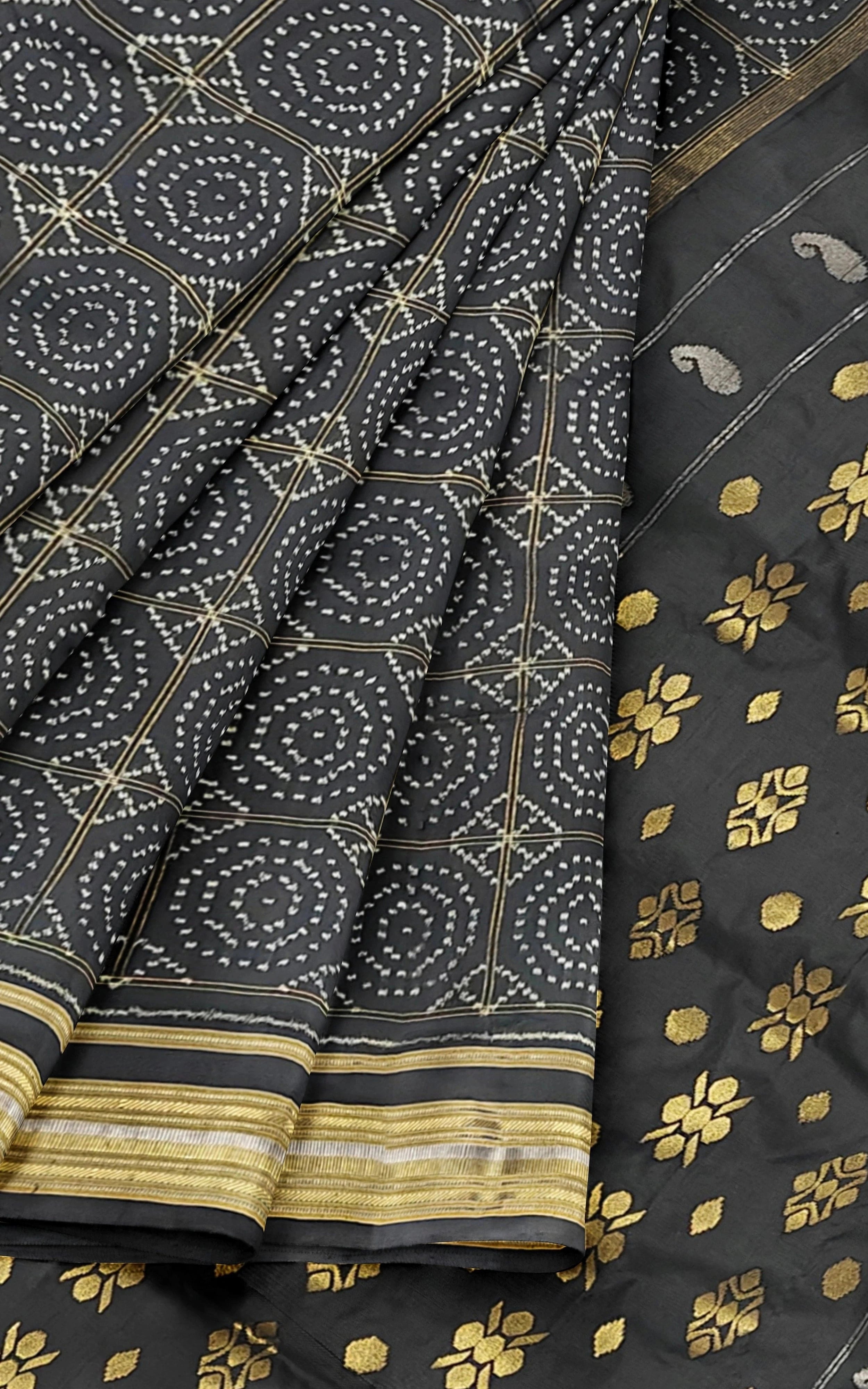 Divasutra Black and Golden Telia Silk Ikkat Saree