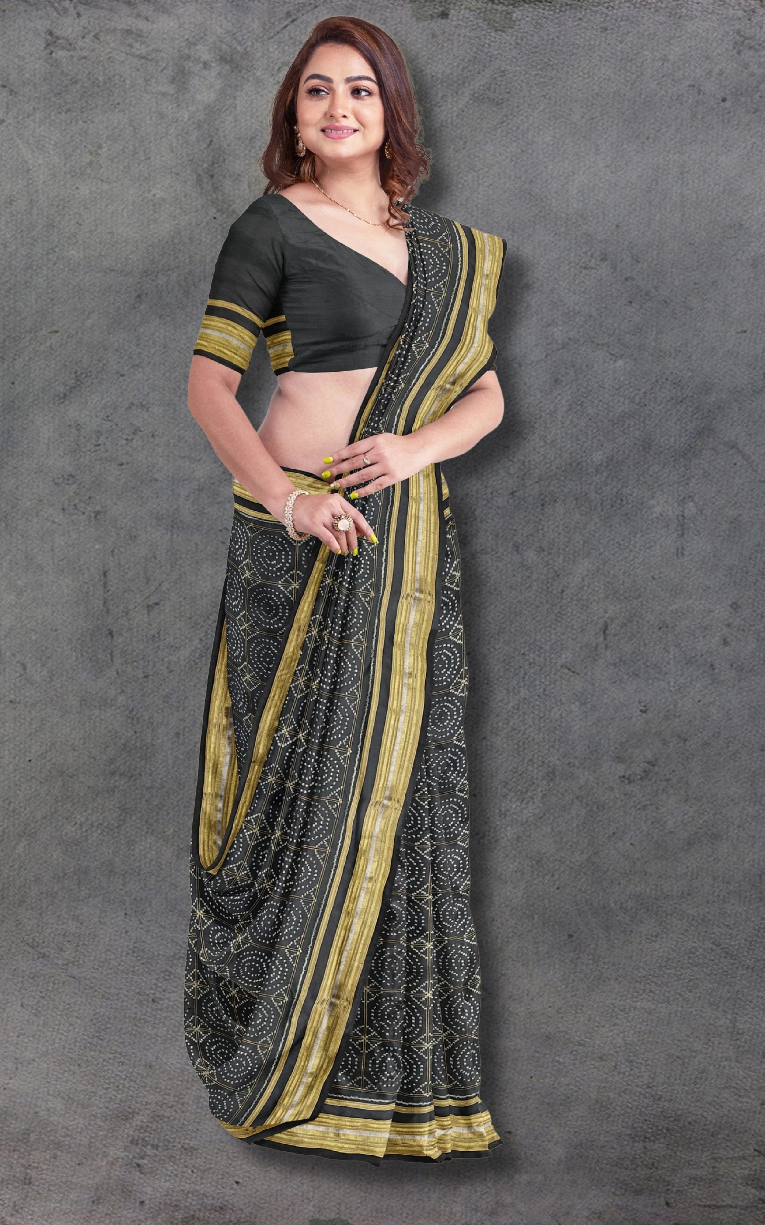 Divasutra Black and Golden Telia Silk Ikkat Saree