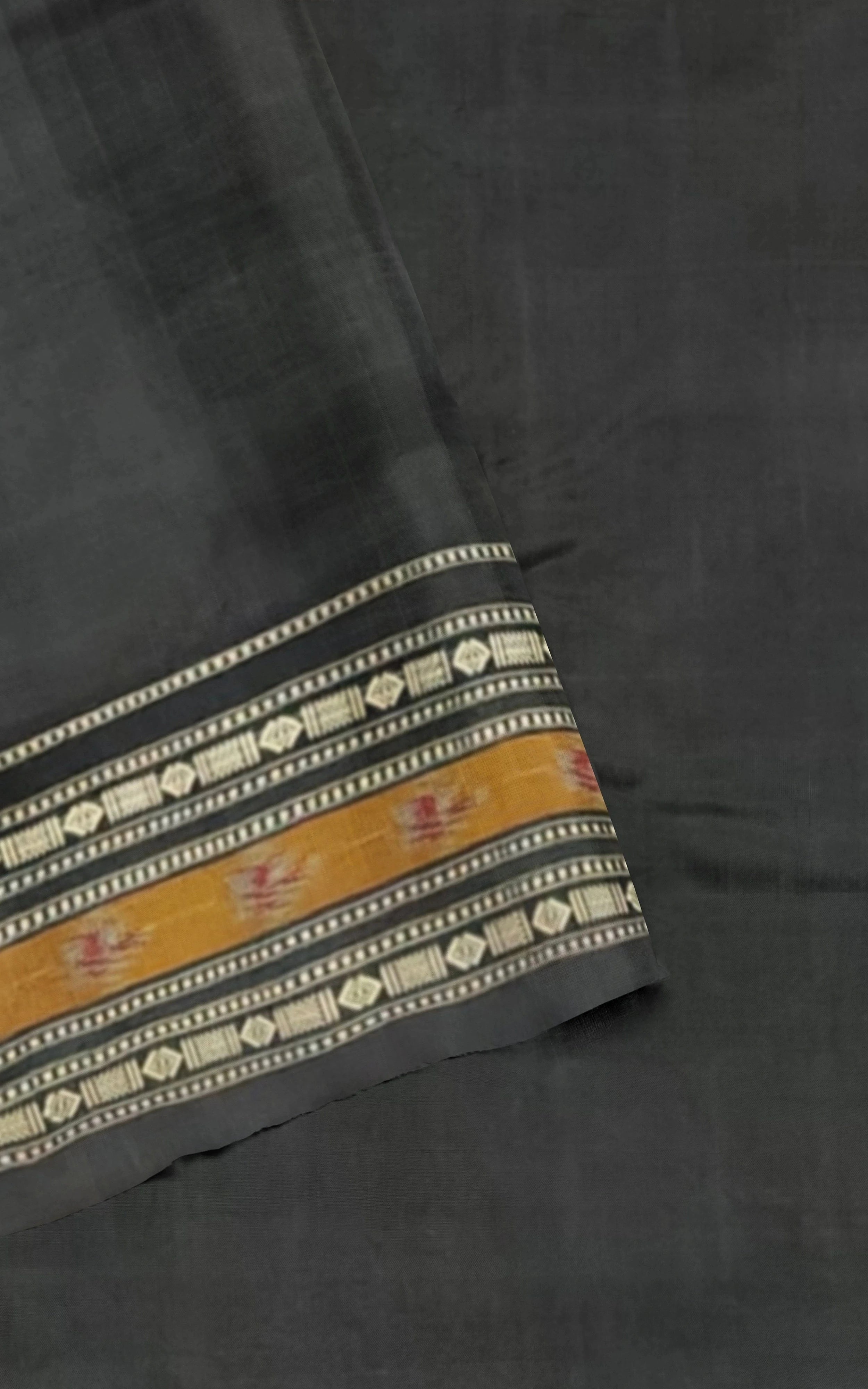 Divasutra Orange and Black Telia Silk Ikkat Saree