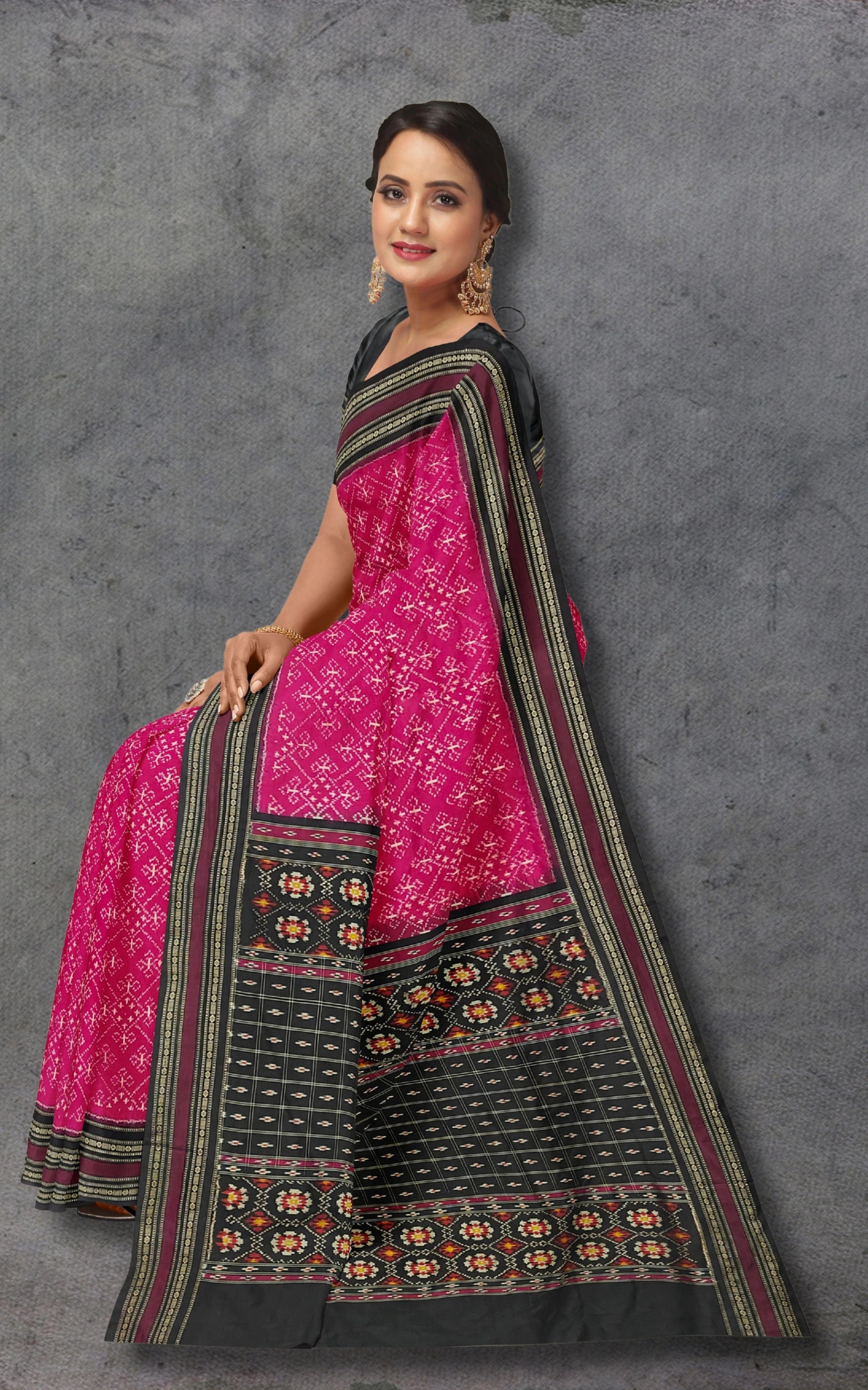 Divasutra Pink and Black Telia Silk Ikkat Saree