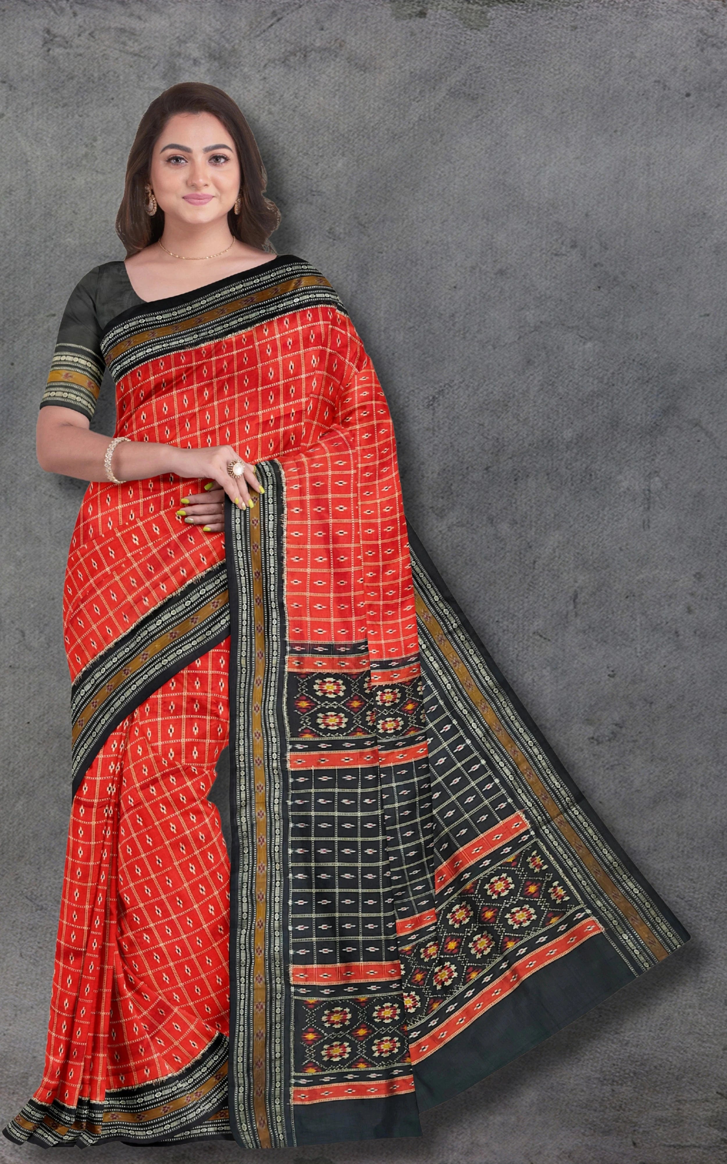 Divasutra Orange and Black Telia Silk Ikkat Saree